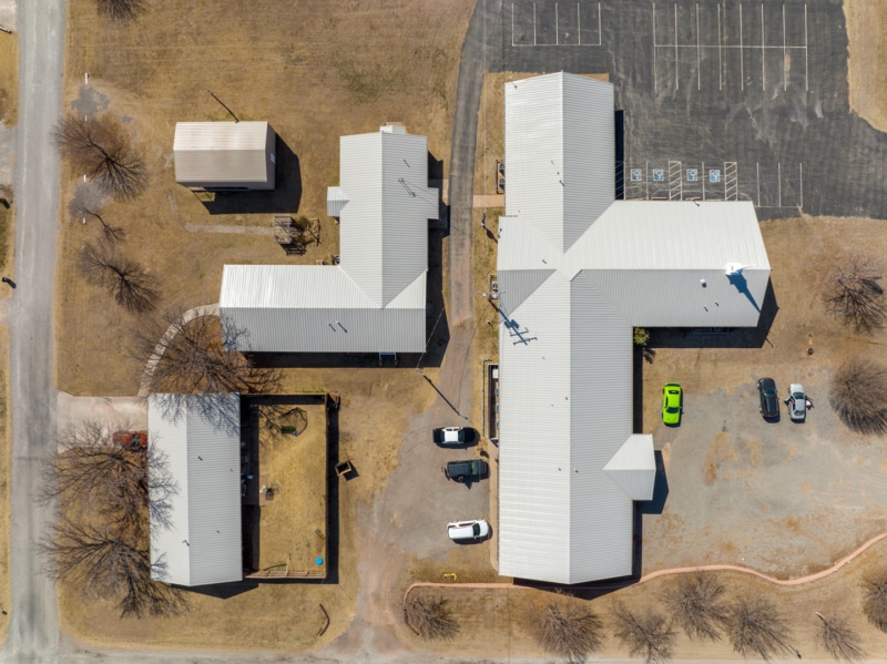 Top-down aerial view of church with metal roof in Oklahoma
