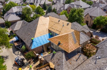 Roof shingle installation on a residential home in Oklahoma