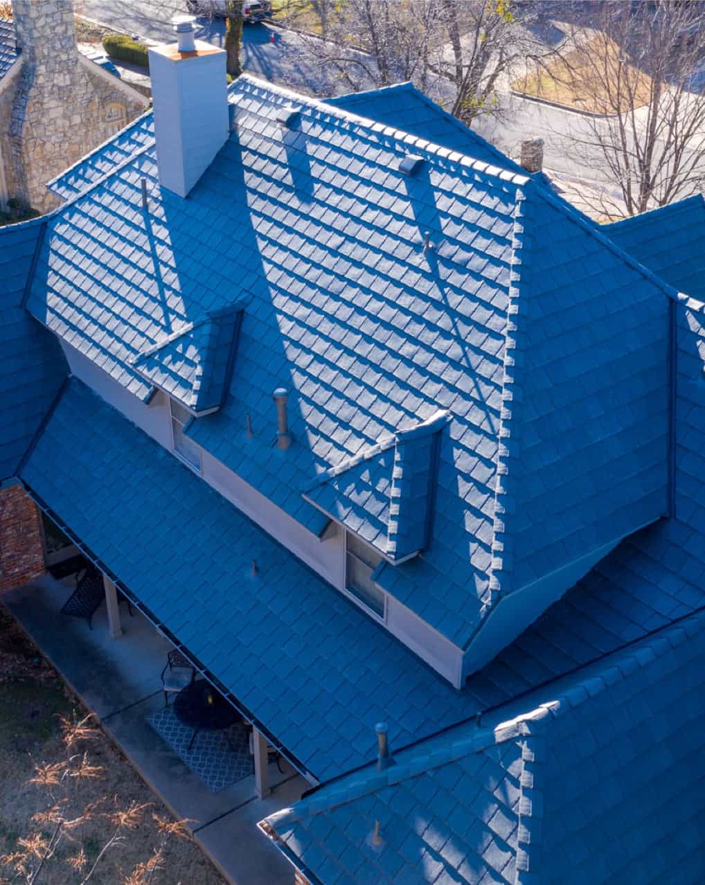 Slate tile roof installation for residential home in Oklahoma