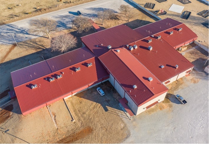 Metal roof replacement for school campus in Oklahoma