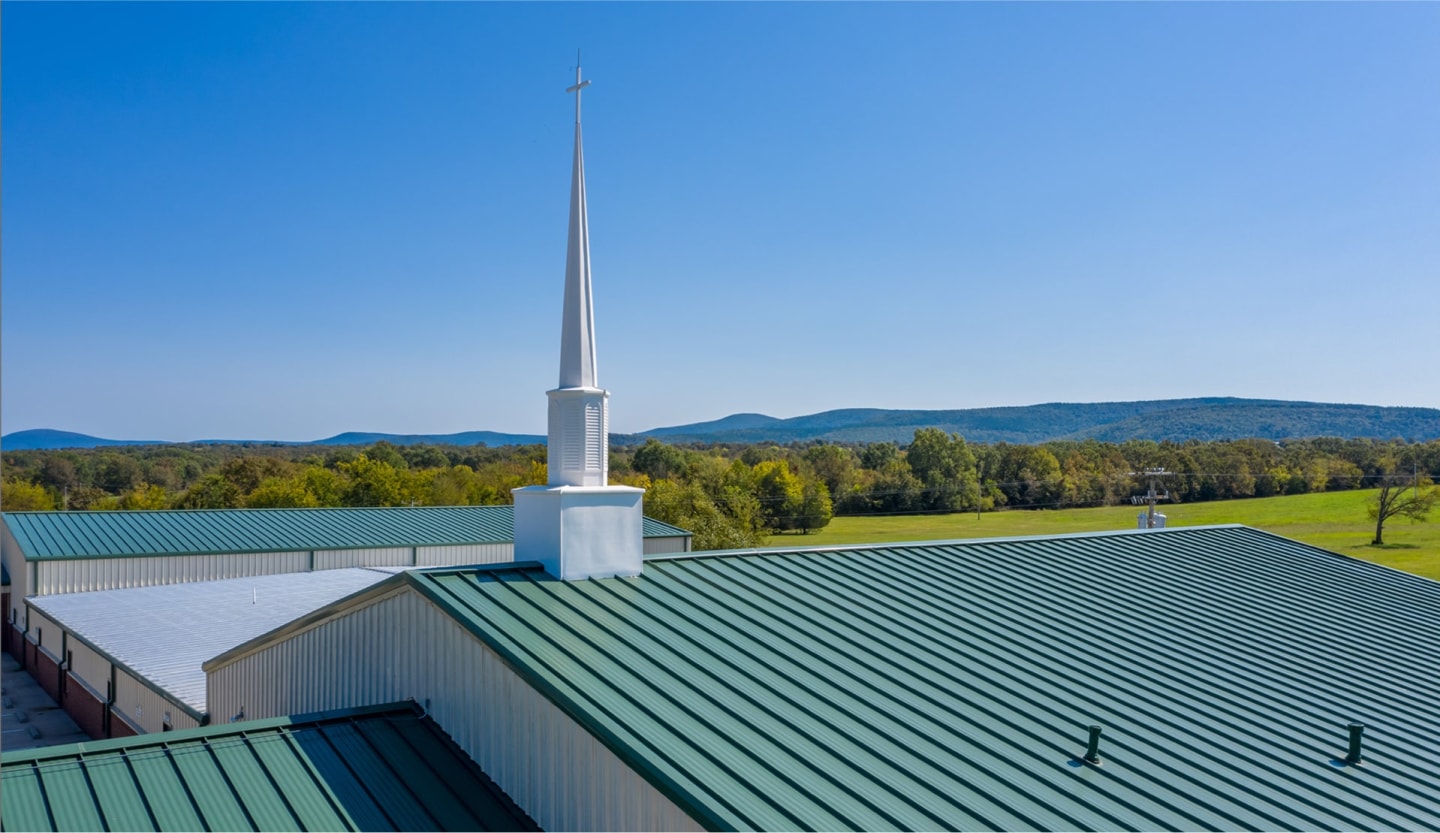 Modern metal roof installation and steeple repair in Oklahoma