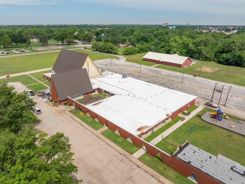 Blackwell First Christian Church Roof Replacement, Custom Single-Length Standing Seam, Commercial Guttering, Flat Roof TPO, Tapered Insulation