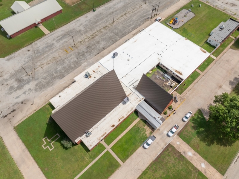 Blackwell First Christian Church Roof Replacement, Custom Single-Length Standing Seam, Commercial Guttering, Flat Roof TPO, Tapered Insulation