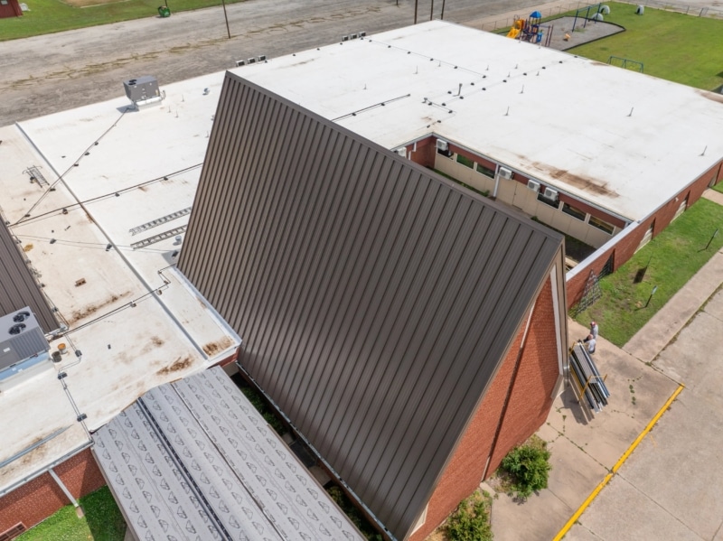 Blackwell First Christian Church Roof Replacement, Custom Single-Length Standing Seam, Commercial Guttering, Flat Roof TPO, Tapered Insulation