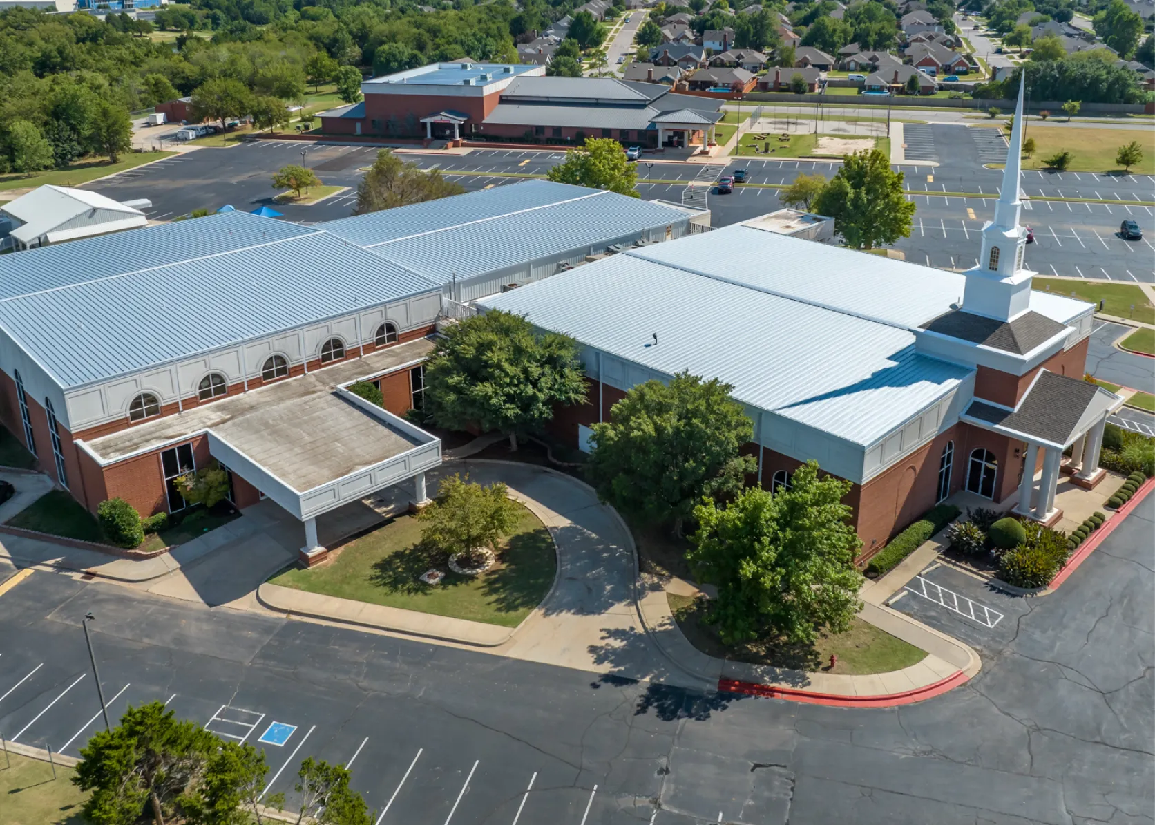 Completed low-slope metal roof for church buildings in Oklahoma