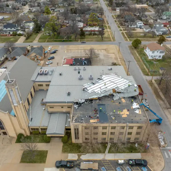 Tornado damage to the metal roof of a church