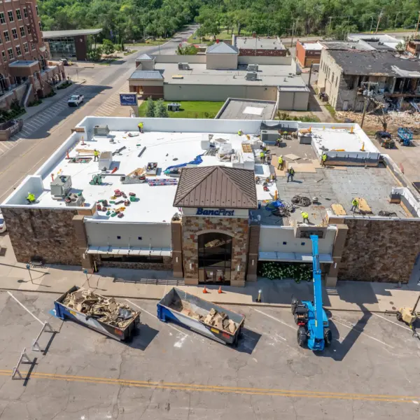 Tornado damage to the flat roof of a bank
