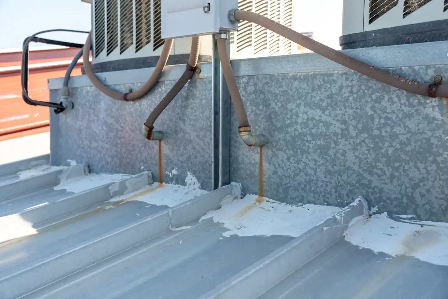 Leaking HVAC units on a metal roof