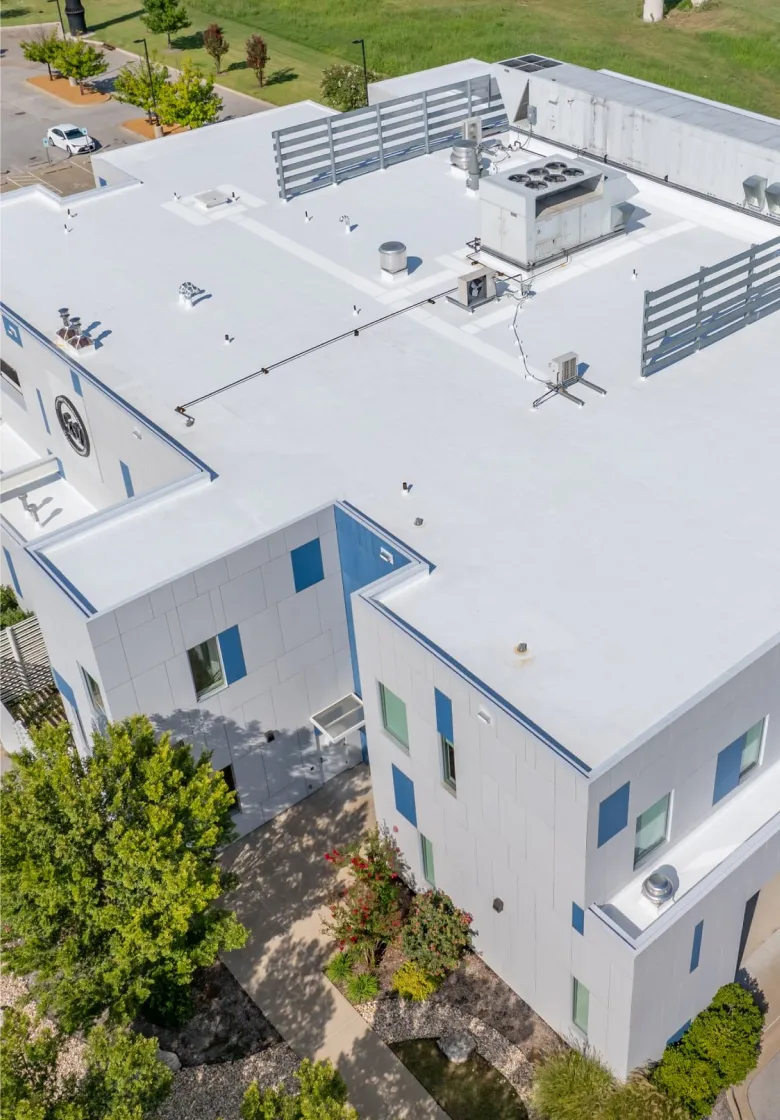 Completed commercial building with new TPO roofing system