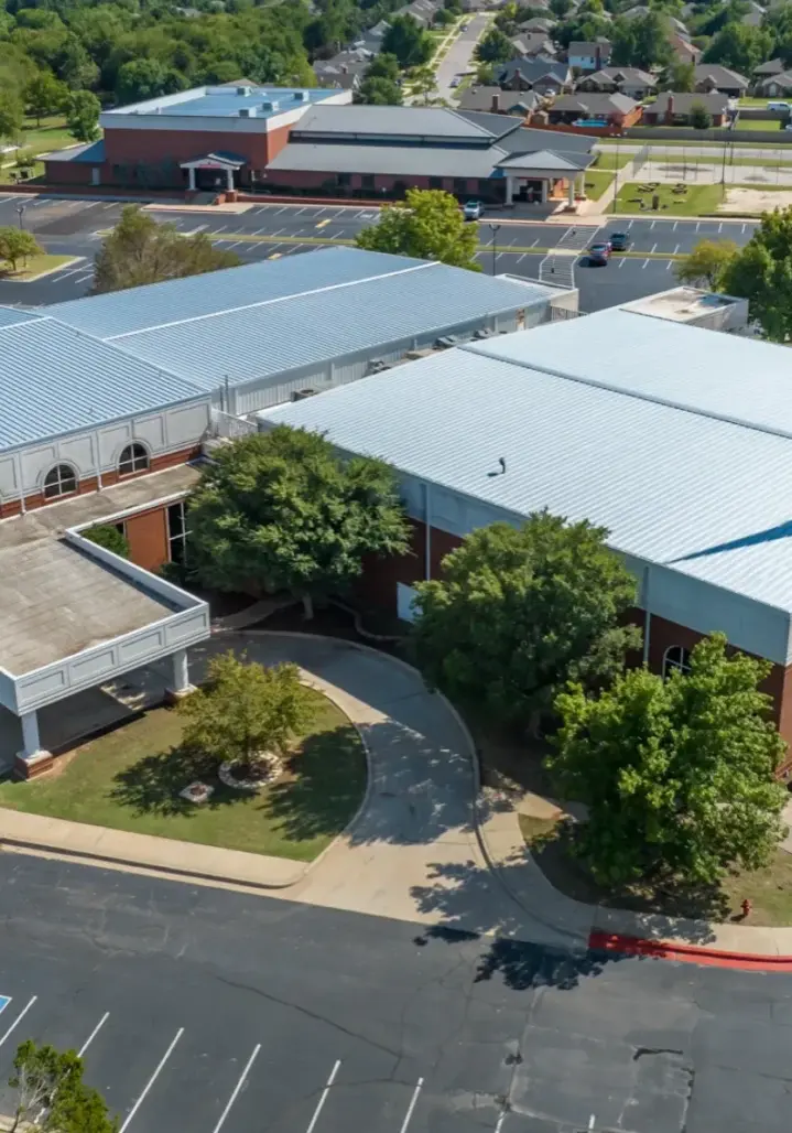 Completed low-slope metal roof for church buildings in Oklahoma